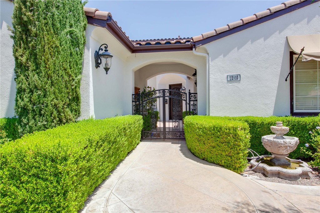 Welcome to 22910 Banbury Court, a stunning Mediterranean-style estate in Murrieta’s prestigious guard-gated Bear Creek community. This 4-bedroom, 3.5-bath home offers over 4,300 sq ft of elegant living space with high-end finishes, a chef’s kitchen, grand entry, and main-floor master suite. Enjoy a resort-style backyard with a saltwater pool, spa, outdoor kitchen/BBQ, and lush landscaping. With a paid-off solar system, private casita, and access to world-class amenities including Jack Nicklaus designed golf course, tennis, fitness center, and more—this home is the ultimate blend of luxury and lifestyle, and it's priced to sell.