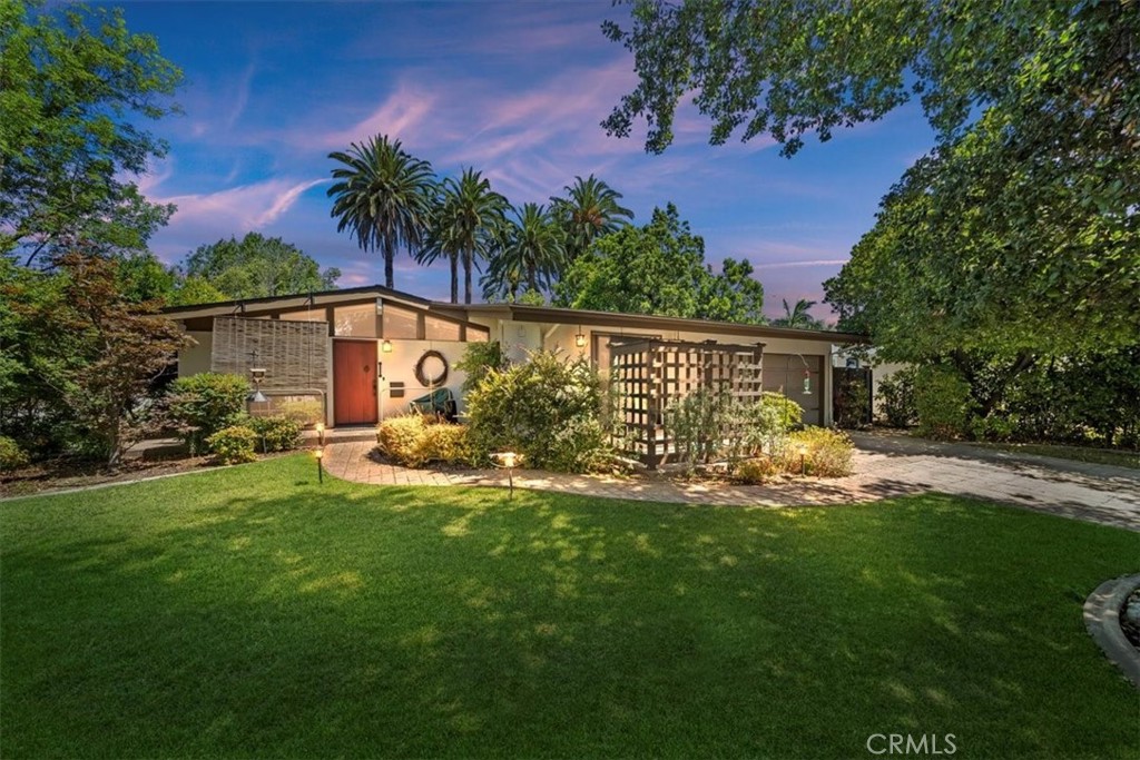 Welcome to 901 E Walnut Ave — a charming 3-bedroom, 2-bathroom home located on a desirable corner lot in the peaceful and highly sought-after city of Glendora. This delightful property offers an unbeatable location just minutes from local restaurants, shops, parks, scenic trails, and museums, all within the sought-after Glendora School District. Inside, you’ll find original hardwood floors, exposed wood beams, custom Dutch doors, and thoughtfully selected interior paint that adds warmth and character. Large windows throughout the home invite an abundance of natural light, creating a bright and welcoming atmosphere. The generous backyard is beautifully landscaped and provides ample space for entertaining, gardening, or simply enjoying the outdoors. Don't miss this rare opportunity to own a timeless home in one of Glendora’s most established