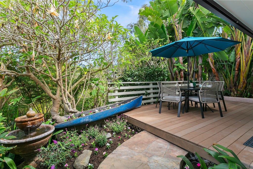 Welcome to your coastal escape! Just steps from the iconic Thousand Steps Beach. This enchanting 2-bedroom, 1-bath beach cottage with attached garage, offers a spacious, lush backyard-ideal for entertaining, relaxing or enjoying the ocean breeze. Walk to the beach and area restaurants. Recently remodeled kitchen and bath, high ceilings, and an open floor plan create a bright and airy living space. The property includes a 1-car garage and driveway parking for 3 cars, offering both comfort and convenience in a prime coastal location. Ample space to add an ADU - perfect for guests, rental income, or a private studio. Don't miss your chance to own a slice of paradise in beautiful Laguna Beach.