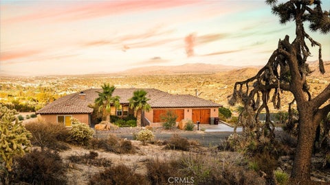 Photo of 7529 Rockaway Avenue, Yucca Valley, CA 92284 (MLS # JT26231517)