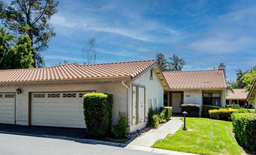 The Villages Golf and Country Club, an exclusive 55+ community, with 24/7 guard gated security. Welcome to this beautifully appointed 1,800 sq. ft single-level condo, with exceptional two large skylights in kitchen and bathroom great natural light. Recessed Lighting in every room. Featuring 2 spacious bedrooms, 2 full bathrooms, and a dedicated custom built office, and attached large two car garages. The open concept living room impresses with a vaulted ceiling, marble fireplace, and a dramatic wall of windows and sliding glass doors that flood the space with natural light and lead to a generous gated patio, perfect for entertaining or relaxing under the retractable awnings. The gourmet kitchen is a chefs dream with brand new appliances including gas stove, granite countertops, a marble tile backsplash, abundant cabinetry, recessed lighting, and a large skylight that illuminates the space beautifully throughout the day. Elegant flooring choices include oak hardwood, travertine, and porcelain tile. New front-loading washer and dryer. Additional highlights, wall-mounted air filters, remote control motorizes blinds, orbit whole house Wi-Fi, two Big Screen TV Sets. Upgrades and stylish finishes make this condo a rare find.