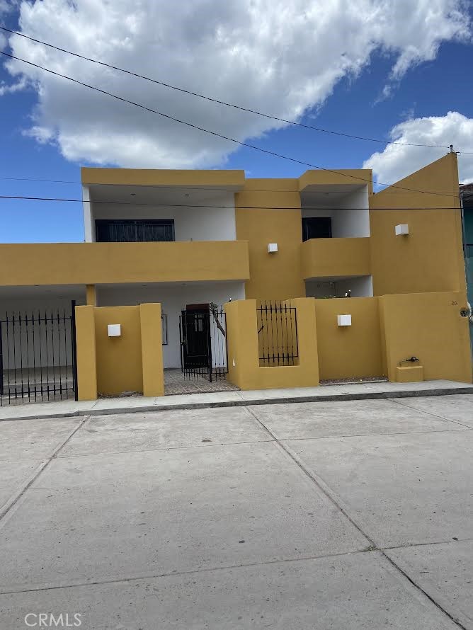 This large lot home offers a magnificent panoramic view of the city skyline, making it one of the best views Located in the exclusive Panorama area, you can enjoy views. From the moment you enter, you are greeted with an open space living room and Dining room close to kitchen, open floor plan seamlessly integrates the living, dining and kitchen areas. Extending the first level with a full bathroom, and a guest bedroom. There is access to back yard to enjoy the beautiful view from anytime of the day! There is one big master bedroom with a Jacuzzi in the bathroom, and walking closet making the perfect master bedroom plus 2 spacious bedrooms and 1 bathrooms located on the second level. This property has gated driveway that access to carport parking space for 3 cars perfect for any size vehicles plus separate open space parking for a R.V. vehicle. LARGE back yard also offers opportunity to build a mother –in-law house or extend the home as well. The whole property lot is fenced. MUST SEE in person to appreciate this beautiful property!