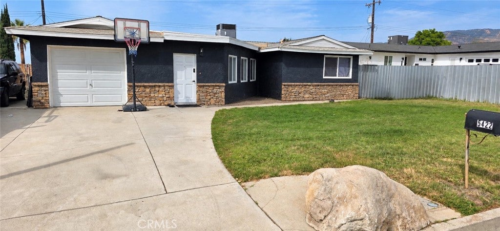Photo of 5422 Newbury Avenue, San Bernardino, CA 92404 (MLS # IV26223619)