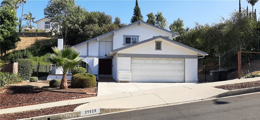 Located in Diamond Bar, Walnut Valley Unified School District, there are 4 bedrooms and 2 full baths in this home, including 2 bedrooms and a bathroom downstairs. Kitchen is newly remodeled with new stovetop, range hood and dishwasher. The outdoor area features a backyard and a patio with a fan and lightings. Two-car attached garage with direct access. Close to 57/60 freeway. Short drive to banks, restaurants and markets.