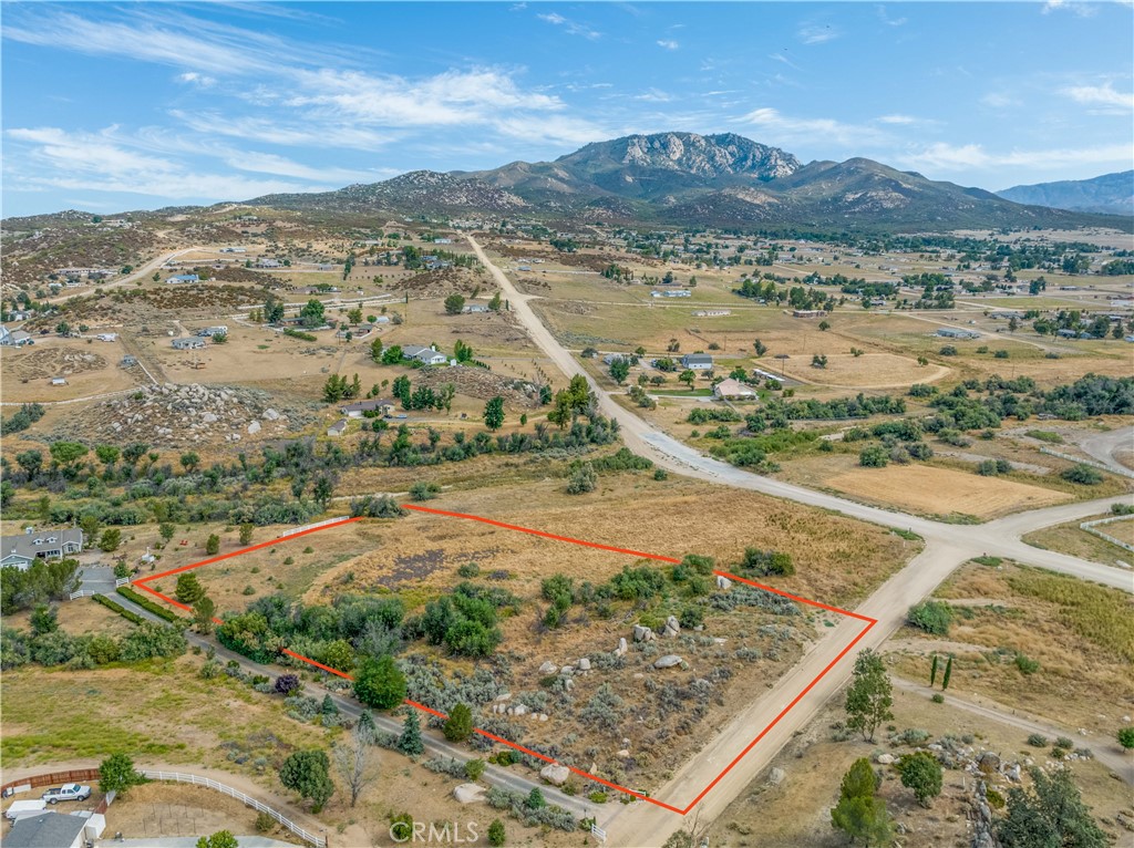 Nestled inside the private community of Lake Riverside Estates, this 2.67 acre beauty is your answer to hectic city life. With subtle hills covered in natural vegetation complimenting cleared and flat expanses of land, walk about and plan your dream home while enjoying fantastic views of Cahuilla Mountain and the seasonal creek just north of the property. Plenty of room for horses, toys, or pretty much anything else you can think of. Don't forget to enjoy all the amenities Lake Riverside has to offer including 55-acre fishing lake, 3,600' lighted airstrip, maintained roads, playgrounds, cabanas, sports courts, pool, security patrol, and gated entry. Come out and embrace country living at its finest with this beautiful lot that is just waiting for you to build your dream home on.