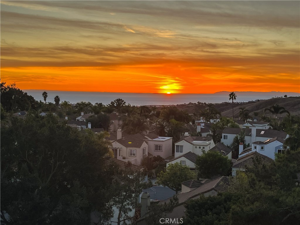 Enjoy breathtaking panoramic views of the ocean, Catalina Island, rolling hills, and vibrant sunsets from this beautifully upgraded first floor 2 bedroom, 2 bathroom home.
Featuring an open concept floorplan, the spacious kitchen offers granite countertops, a breakfast bar, and stainless steel appliances. Kitchen flows seamlessly into the dining and living areas which features new luxury vinyl plank flooring. Both bedrooms are nicely sized with ample closets and remodeled ensuite bathrooms. Step outside to the large private patio area where you can enjoy amazing views and tranquil scenery.
Additional upgrades include fresh interior paint, dual-pane windows, stackable washer/dryer and a detached one-car garage. Beautifully maintained community with resort-style pools and serene water features. Excellent location! Just minutes to San Clemente’s renowned beaches, shopping, top rated schools, hiking and freeway access.
