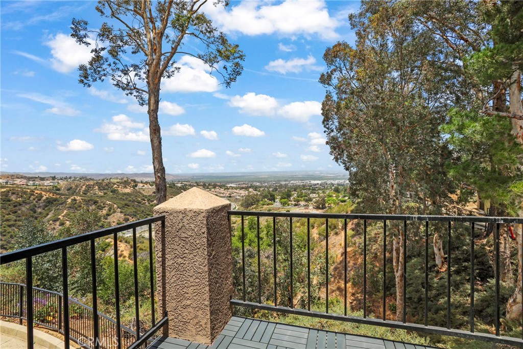 MILLION DOLLAR VIEWS OF THE VALLEY- STUNNING CONDO with UNMATCHED VIEWS in CROWN VILLAS!
Welcome to Crown Villas—where sweeping mountain and city views meet elevated, modern living! Tucked away in the serene foothills of the Cleveland National Forest, this stylishly upgraded condo is the perfect escape for those who love nature, luxury, and convenience. Major Vibes Inside – Freshly painted throughout with warm, inviting tones. New modern lighting adds the perfect ambiance, while the rainfall shower head turns your bathroom into a spa-like retreat. New cabinet pulls add a sleek finish to the open-concept kitchen. Vaulted ceilings and newer flooring give the space an airy, sophisticated feel. And yes—private indoor laundry with stacked washer & dryer makes life that much easier. Step Outside, Stay Inspired – Watch sunsets melt over the skyline from your private balcony, or hit the nearby hiking and wilderness trails just minutes away. Resort-Style Living – Enjoy access to a sparkling pool, relaxing spa, fitness center, tennis & basketball courts, a dog park, and lush green open spaces. Whether you're soaking in golden hour views or starting your morning with mountain air, this place hits different. Centrally located near shopping, dining, top-rated schools, golf courses, and the Santa Ana River—this is more than a home; it’s a lifestyle.