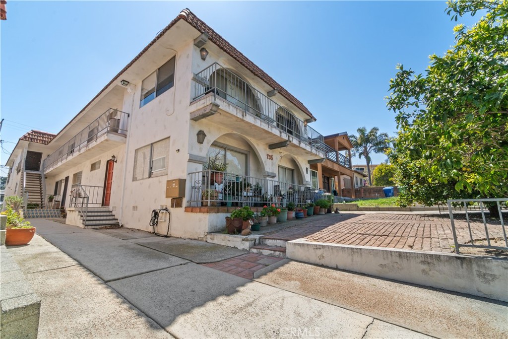 Spacious 4,886 SF with ocean and harbor views, this well-maintained 4-plex in San Pedro’s PRIME sought-after Point Fermin neighborhood offers an exceptional owner-user or investment opportunity. The property features a desirable unit mix: (1) 3-bed/2-bath, (2) 2-bed/2-bath, and (1) 1-bed/1-bath units. The spacious owner’s unit includes an enclosed terrace and arched walkways....Additional highlights include three tandem garages (6 spaces total), one exterior parking spot, washer/dryer hookups in each unit, and separate gas and electric meters.
With over 67% upside in monthly rental income and a projected 8% CAP Rate once brought to market rent, this PRIDE OF OWNERSHIP property is ideally positioned for long-term growth. Located near the revitalized San Pedro Waterfront Park and local hot spots like Colossus and Trani’s Dockside, it sits at the center of one of LA’s most promising coastal neighborhoods. Seller will cooperate with owner-occupied eviction.
