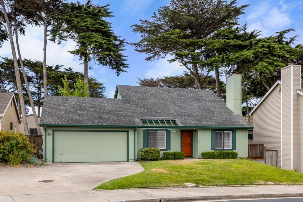 Located on a private cul-de-sac, is this 3 bedroom, 2 bathroom, 1,330 sq ft, two-story home, with spacious 2-car attached garage. One bedroom and bathroom on ground floor. Vaulted ceiling and fireplace in living room. Double-pane windows. Granite counters with tile backsplash in kitchen and newer range and dishwasher. Built-in microwave. Stainless refrigerator. Washer and dryer in garage, with extra freezer. Fenced backyard with above-ground hot tub. Roof replaced in 2004. Near Marina State Beach, park, library and shopping. Neighborhood in a PUD with an HOA $200/month, which covers front yard and road maintenance. Being sold "AS IS".