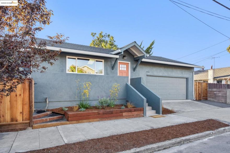 Beautifully appointed and spacious South Berkeley home features one-level living and a stunning garden! Every inch of this home has been renovated (with permits) in 2025, and it shows. From the vaulted ceiling with skylights to the elegant wood kitchen cabinets, from the expansive en suite bathroom to the ideal layout, this home leaves little to be desired. Three bedrooms and three bathrooms offer space for all, and this home features ample storage both inside and in the gracious attached two-car garage. The verdant garden features spaces for dining al fresco and kicking a ball around, the perfect space to entertain and enjoy the indoor-outdoor connection! Updates in 2025 include new roof + skylights, 200 amp panel and electrical, all new dual-pane windows, stainless steel appliances, new furnace, structural and seismic work per City of Berkeley requirements, and more! Near local favorites like San Pablo park, Ashby BART, Berkeley Bowl West, and Berkeley Ironworks climbing gym, this home is perfectly located.