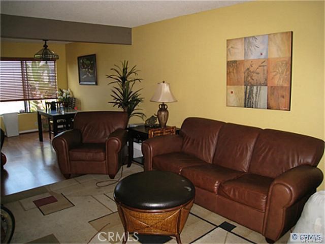 Lovely and private 2story 2 bed 1.5 bath condo is located halfway between downtown and retro row in the alamitos beach neighborhood. Enjoy all of the nightlife and beach access a mere steps from your front door! You will love living in this two story gated community that is very unique to the area and comes with a subterranean garage and 1 parking space. Community also features a laundry room. The unit features beamed vaulted ceilings with a fireplace and a good sized kitchen with a dishwasher. Hardwood flooring throughout. Water, trash, sewer and refrigerator is included.