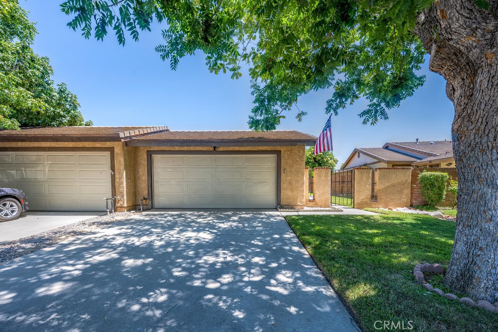 Welcome to this popular Sunrise home located in the heart of Valencia! This 2 bedroom + 2 bath home is in a wonderful location near Almendra Park and the paseos. As you approach the home, you’ll be greeted by a nice sized private courtyard area then into the home where you'll find the living area featuring wood flooring. Step into an upgraded kitchen that is a chef’s delight! Modern cabinets, tile countertops, and stainless-steel appliances. Recessed lighting illuminates the space, providing a bright and welcoming atmosphere. The seamless flow from the kitchen to the dining area creates an inviting space with a sliding door that opens up to a patio and nice sized backyard, ideal for barbecues, outdoor play, or simply relaxing. Both bathrooms have been thoughtfully upgraded to include tiled showers, modern bathtub, stylish countertops, and sleek cabinetry, providing a spa-like experience every day of the week. The spacious 2-car garage has lots of cabinet space and a dedicated washer/dryer area.
This home is situated in a fantastic neighborhood, just a stone's throw away from beautiful parks, paseos, and award-winning schools. Whether you're looking to shop at nearby stores, enjoy dining at local restaurants, or require quick access to Henry Mayo Hospital, you’ll find everything you need right at your doorstep. Don’t Miss Out! This Sunrise home in Valencia is a great find! Schedule a showing today and discover how this delightful property can be your new home.