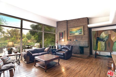 Photo of 3201 Benedict Canyon Drive, Beverly Hills, CA 90210 (MLS # 25591069)