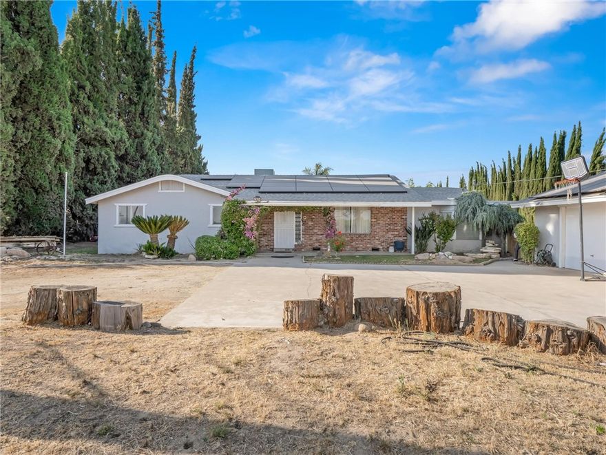 Best of both worlds with an easy commute route and near HWY 41 while enjoying the benefits of country living and solar! This 3/2 home has the potential for a 4th bedroom. You can utilize that extra space as a family room or home office if needed. The kitchen has two dining spaces. The living room is spacious and opens to enclosed patio. The enclosed patio would make a great game room or media center. The backyard is set up to entertain with a pool, plenty of grass space and concrete pad ready to host any type of party. The backyard has a storage shed as well as an entertainment type set up. There is plenty of space for RV parking and a 2nd driveway for easy access to the backyard. The lot is deep and there is plenty of extra space on the property to customize it as you wish. Are plantings what will suit your needs or possibly building a 2nd home? Make it out to take a closer look.