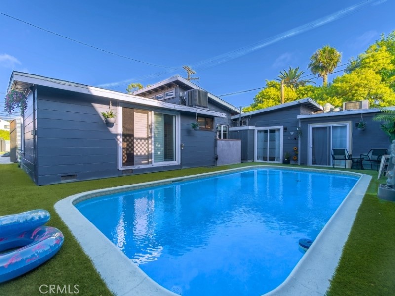 Modern Corner-Lot Oasis with Dual Living Potential in Los Angeles:
Welcome to this stunning and versatile modern home in the heart of Los Angeles! Set on a desirable corner lot, this beautifully upgraded single-family residence offers the unique layout of a duplex-style home — perfect for multigenerational living, work-from-home setups, or potential rental income.
The main home features 2 spacious bedrooms, 1 full bathroom, a cozy fireplace, and a bright, open-concept living space designed for comfort and style.
The additional private living space, with its own separate entrance, includes a full kitchen, laundry area, a dedicated office, 2 bedroom, and a private full bathroom — offering independence and privacy while remaining under the same roof.
Enjoy year-round comfort with A/C units in both sections of the home. Step outside into your private paradise featuring a heated pool and spa, ideal for relaxing or entertaining.
Additional features include:
Electric gated driveway for secure parking
Low-maintenance corner lot with privacy and curb appeal
Thoughtfully designed layout with modern upgrades throughout
Don’t miss this rare opportunity to own a home that blends flexibility, functionality, and luxury — all within one of L.A.’s most sought-after neighborhoods.
