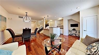 Welcome home to Fusion in the South Bay! This contemporary unit offers a living, dining, kitchen open floor plan. One bedroom and full bathroom on the main level and upstairs is the primary bedroom with en-suite bathroom. The primary bedroom has a walk in closet with a custom closet organizer. Central air conditioning/heating, maple hardwood floors in the living room and bedrooms, newer kitchen cabinets and granite counter tops. All major appliances included. Stackable washer and dryer conveinently located in the unit. A large balcony overlooking the resort-like pool is perfect for a BBQ and outdoor entertainment, it feels like an extension of your living room. This corner end unit offers natural light throughout and privacy. It includes a detached 1-car garage with storage racks and one assigned open space parking #28.
Fusion is a gated community. It is located near the Metro bus or Green Line train and close proximity to the freeway. Beaches, shopping, & restaurants are minutes away. Gated community features water-wise landscaping, children's play structure, exercise trail, basketball court, pool, spa, and picnic park. Award-winning K-12 Wiseburn schools.