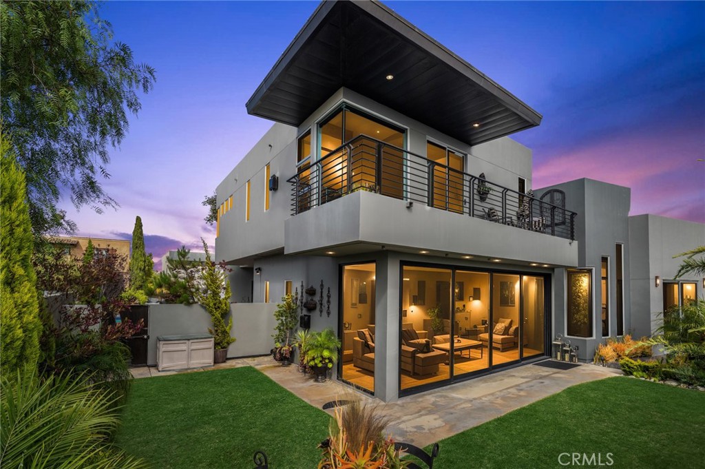 Perched in the highly sought-after Top of the World neighborhood, this fully furnished Laguna Beach retreat offers the perfect blend of upscale coastal living and everyday comfort. With panoramic ocean and Catalina views, refined interiors, and beautifully landscaped outdoor spaces, this luxury home is designed for both relaxation and entertaining.
The bright, open-concept layout features a stylish living area and a gourmet kitchen with granite countertops, walk-in pantry, and high-end appliances. A dedicated downstairs office provides a quiet, private space for remote work or creative pursuits. Indoor-outdoor living is effortless, with multiple spaces to gather or unwind while enjoying the ocean breeze.
Upstairs, the primary suite is a peaceful sanctuary boasting stunning coastline views, a gas fireplace, a spa-inspired bathroom with soaking tub and walk-in shower, and a private balcony—ideal for quiet mornings or sunset views. The secondary bedroom includes a queen bed, its own beautifully finished bathroom, and a private balcony overlooking the serene surroundings.
The outdoor living space is truly exceptional, featuring a built-in BBQ, fire pit, tranquil water feature, lush lawn, and multiple seating areas—perfect for entertaining or simply relaxing in your own private oasis.
Just around the corner are Alta Laguna Park and the iconic Top of the World hiking trail, offering breathtaking views, tennis and pickleball courts, sports fields, and a playground. Only minutes away, you’ll also find the vibrant Village of Laguna Beach, home to charming shops, renowned restaurants, art galleries, and more. With top-rated schools nearby, this home is ideally positioned to enjoy the best of the Laguna Beach lifestyle.