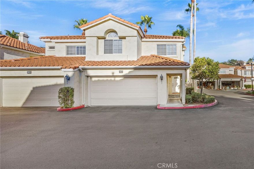 Welcome to this stunning 2-bedroom plus loft, 2.5-bath home located in the highly sought-after community of Vilamoura at Rancho San Clemente. Enjoy resort-style living with amenities including a sparkling pool and relaxing spa.

Step inside to an inviting entryway that opens to the living room with soaring vaulted ceilings and abundant natural light streaming through the second-story windows. This home has been beautifully remodeled throughout, featuring a fully upgraded kitchen, bathrooms, and new flooring.

The kitchen showcases modern cabinetry, quartz countertops, and LED recessed lighting. Plantation shutters add a touch of elegance throughout the home. The primary bedroom offers a private balcony and an en-suite bath with dual sinks, new fixtures, custom mirrors, and a fully remodeled tile shower.

Enjoy the wrap-around yard with both hardscape and landscaped areas—perfect for relaxing or entertaining. Additional highlights include indoor laundry and an attached garage.