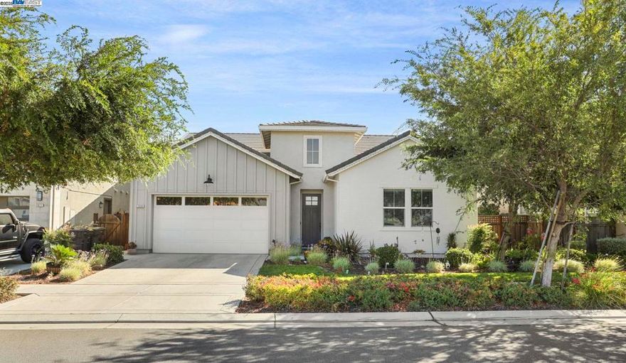 Welcome to Newport at River Islands built by Kiper Homes. Seller will credit buyer concessions towards closing cost. This southwest facing single-story home combines modern design with everyday functionality. Featuring 3 bedrooms plus a flexible den, with Murphy Bed included.—perfect for a guest , home office, or craft space—this home also offers the potential for a 4th bedroom. With 2.5 bathrooms and soaring 10-foot ceilings, the open floor plan creates an inviting and spacious atmosphere. The great room is anchored by a fireplace and flows seamlessly into the California room, complete with a ceiling fan for year-round comfort. The chef’s kitchen includes designer pendant-lit island, high-end appliances, walk-in pantry, and abundant storage. Interior laundry room with sink and storage space. Outdoor living is enhanced with a professionally finished concrete patio, low-maintenance front yard landscaping, and a Tuff Shed for extra storage. NO HOA Fees. Nearby you'll find a serene lake, parks, scenic trails, and local schools—including three elementary schools (STEAM Academy, River Islands Technology Academy, and EPIC Academy) and River Islands High School. This home is not only beautifully designed but ideally located for an active lifestyle. Come make this house, your next home.