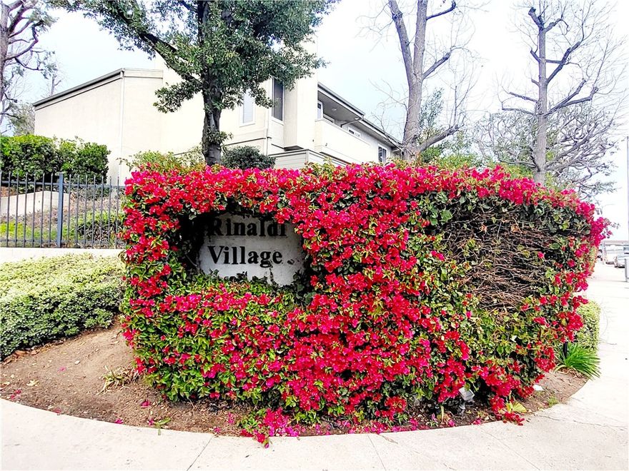 Welcome to The Rinaldi Village Community, nestled in the northern part of Granada Hills. This is a lovely two story townhouse filled with natural light (only 4 units attached) on the West side of Midwood Drive. This home offers a multi-level layout; from the open dining area you'll step down to an open bright living room leading to a spacious balcony perfect for enjoying the beautiful views of valley and the city lights. The nice size kitchen offers tile countertops, ample cabinetry and a private patio. There is a convenient half bathroom for your guest off the entry. Upstairs, you’ll find a spacious primary bedroom with a large bathroom and a walk-in closet. The 2nd bedroom is cozy and inviting with a hallway bathroom adjacent. The two car garage has a laundry area and storage space with direct access into the unit. The community offers gated entry, lush landscaping, a pool, and guest parking.

This is a Standard Sale*