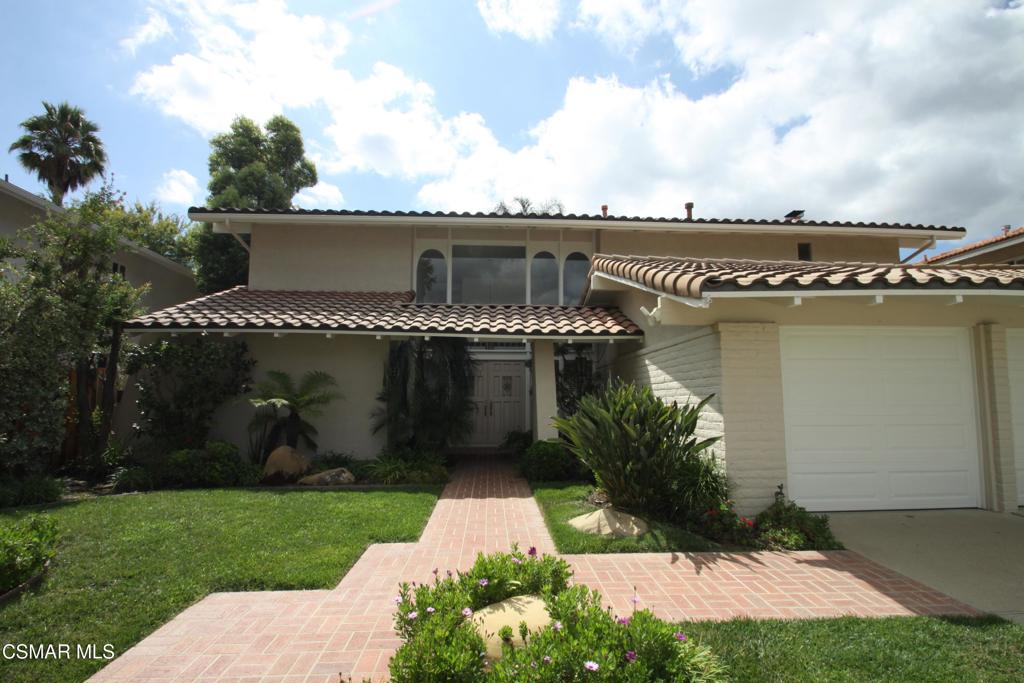 Highly desirable Foxmoor home located in beautiful Westlake Village! This lovely 5 bedroom, 3 bath home features stunning wood-like laminate flooring downstairs, plush newer carpet upstairs, and freshly painted interior throughout. Upgraded kitchen with beautiful white cabinetry, granite counters, stainless steel appliances including fridge, dishwasher, oven, microwave and 5 burner cooktop and separate eating area. Large living room with lots of windows, plantation shutters and formal dining room. Spacious family room has painted white brick gas fireplace & wet bar. Massive upstairs area including huge primary bedroom w/extra large closet & built-in shelves and 4 nice size secondary bedrooms. Bathrooms have laminate flooring, lots of cabinets and separate vanity area. Lush and well-maintained landscaping in front and back yards. Central heating and a/c, 3 car garage, tile roof. Located in prestigious Westlake Village and close to parks, hiking & biking trails and award winning schools. Community pool and clubhouse. Fridge, washer & dryer and gardener included.