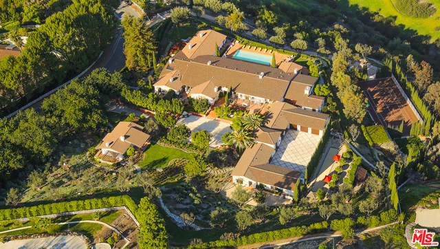 AUCTION WITHOUT RESERVE, JULY 26TH, 2018. Hacienda de la Paz, a millennium of art, architecture & engineering under one roof. Positioned on 7.4 acres, the Spanish estate designed by legendary architect Rafael Martos took 17 years to build and is the 36th largest residence built in the U.S. Perched 1100 ft. above LA on the Palos Verdes Peninsula in the guard-gated city of Rolling Hills; one of the safest & wealthiest cities in America. 180-degree panoramic views encompass the Pacific Ocean, beaches, downtown & the San Gabriel Mountains. Resort amenities include a 10,000-sq. ft. hamam spa, 15,000 sq. ft. grand ballroom (can accommodate a basketball court, indoor horse arena or car showroom), 2 tennis courts; indoor & outdoor, 2 swimming pools; indoor & outdoor, direct access to horse stables, arenas & 57 miles of equestrian trails, guesthouse, bocce court, gym, yoga room, wine cellar, catering kitchens, geothermal heating/cooling, heated floors, elevators, 6 car garage and motor court.