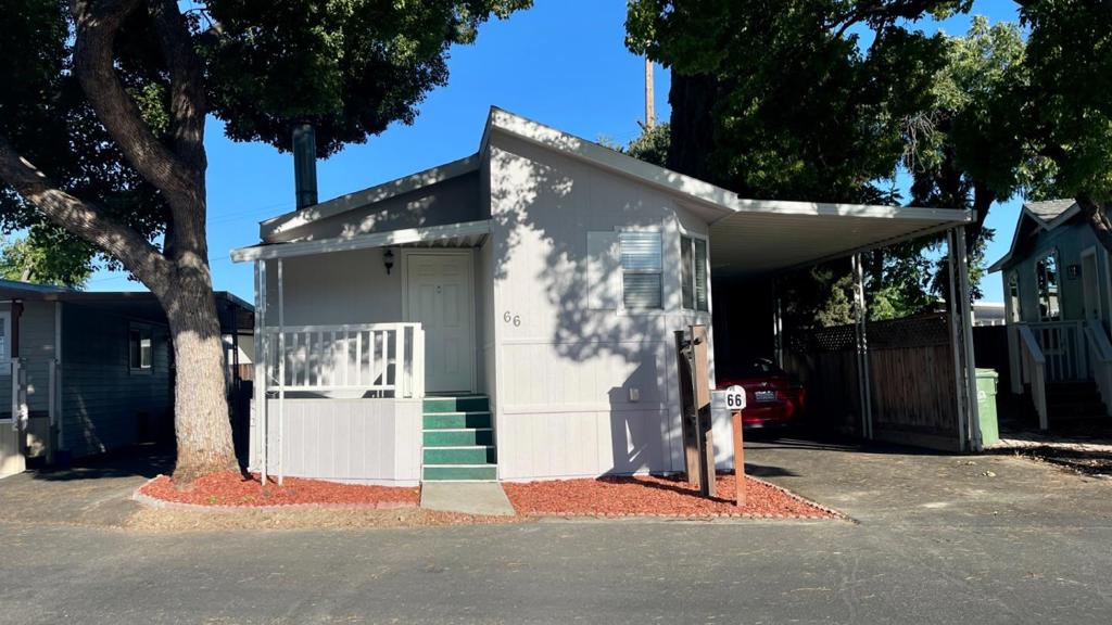 Beautifully remodeled 3 bed, 2 bath double-wide manufactured home built in 2000, located in a desirable all-age park with one of the lowest space rents in San Jose just $833/month! This move-in ready home features fresh paint inside and out, new siding, brand-new flooring, soaring high ceilings, dual pane windows, central heat and AC, and a charming gated backyard perfect for relaxing or entertaining. Enjoy private parking for up to 3 cars and a convenient location close to major highways, shopping, restaurants, and more. An incredible opportunity to own an affordable, stylish home in the heart of Silicon Valley!