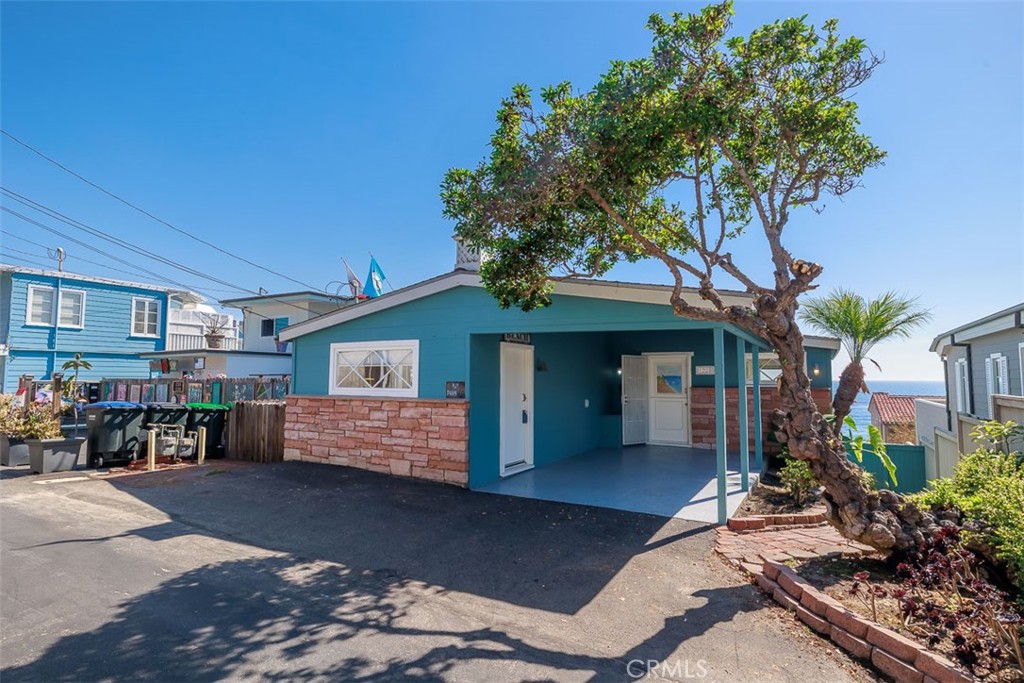 Live the beach lifesyle in this fantastic 2 bd - 2 ba cottage. Located just a few steps from the very desireable Brooks Street Beach on the West side of the Pacific Coast Highway. Relax and enjoy white water views and the fabulous Ocean facing deck above the blue pacific. Lots of atmosphere to enjoy with the huge living room windows framing the Ocean and Coastline. The living room fireplace is perfectly situated to complete the vibe. This beauty is newly remodeled with new appliances, flooring, faucets, window coverings, light fixtures, bath cabinets & hardware. The large kitchen is a chefs dream with lots of cabinets and counter space. Walk to the sand in just a minute or stroll and enjoy many of Laguna Beach's best restaurants moments away.
Great shopping too! Parking for up to 3 cars on site is a huge plus! Washer and dryer included. An exciting opportunity in one of the best locations Laguna Beach has to offer.