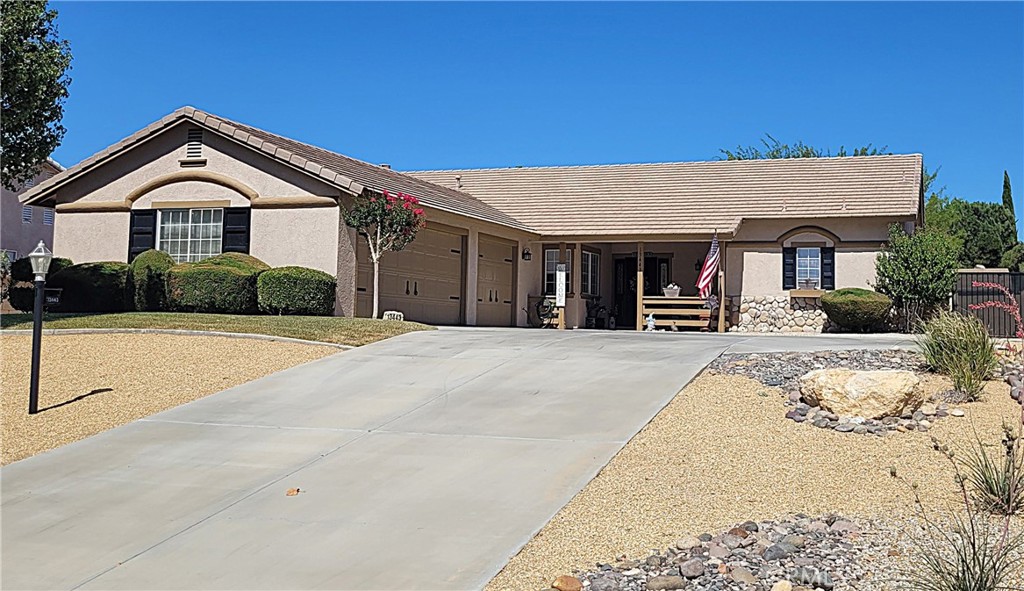 Located in the heart of Apple Valley, this beautifully maintained 3-bedroom, 2-bathroom home offers comfort, functionality, and pride of ownership. The spacious 3-car garage provides ample room for vehicles, storage, and all your toys. Ideally situated in one of Apple Valley’s most desirable neighborhoods, this home combines convenience and charm. Step inside to discover an open-concept floor plan with an airy kitchen and living room—perfect for entertaining or everyday living. The kitchen features generous counter space and convenient pull-out drawers in every cabinet, flowing seamlessly into the main living area to create a warm, welcoming atmosphere.
Outside, enjoy low-maintenance landscaping with an automatic sprinkler and drip irrigation system for easy upkeep. A beautiful, covered patio offers the perfect space for outdoor relaxation, while the powered shed provides additional storage or a great workspace for hobbies and projects. Additional highlights include a newer water heater with instant hot water, a drive-through side gate for backyard access. Don’t miss your chance to own this exceptional home in a prime Apple Valley location—close to schools, shopping, and entertainment!