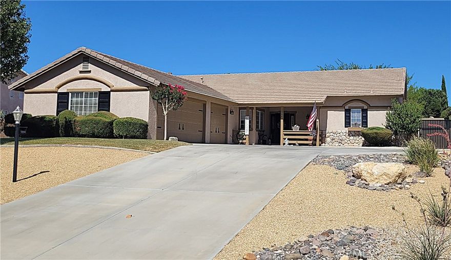 Located in the heart of Apple Valley, this beautifully maintained 3-bedroom, 2-bathroom home offers comfort, functionality, and pride of ownership. The spacious 3-car garage provides ample room for vehicles, storage, and all your toys. Ideally situated in one of Apple Valley’s most desirable neighborhoods, this home combines convenience and charm. Step inside to discover an open-concept floor plan with an airy kitchen and living room—perfect for entertaining or everyday living. The kitchen features generous counter space and convenient pull-out drawers in every cabinet, flowing seamlessly into the main living area to create a warm, welcoming atmosphere.

Outside, enjoy low-maintenance landscaping with an automatic sprinkler and drip irrigation system for easy upkeep. A beautiful, covered patio offers the perfect space for outdoor relaxation, while the powered shed provides additional storage or a great workspace for hobbies and projects. Additional highlights include a newer water heater with instant hot water, a drive-through side gate for backyard access. Don’t miss your chance to own this exceptional home in a prime Apple Valley location—close to schools, shopping, and entertainment!
