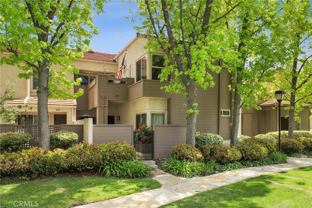 Nothing says motivated better than a $76,000 price improvement . . . forget the FEDS, your wait is over . . . Yes, $625,000.00 . . . Run, dont walk and Step into style and serenity with this immaculate single-story ground-floor home, perfectly situated in a peaceful, park-like community. This beautifully maintained residence shows like a model home, with attention to detail and pride of ownership throughout. Enjoy effortless indoor-outdoor living with two private patios, ideal for relaxing, entertaining, or dining al fresco. Recently upgraded patio pavers add charm and durability to your outdoor spaces, creating a seamless extension of your living area. Inside, you’ll find a bright and open floor plan with modern finishes, spacious living areas, and a clean, contemporary aesthetic that feels both warm and sophisticated. With no stairs to climb and all the convenience of single-level living, this home offers the perfect blend of comfort, elegance, and low-maintenance lifestyle. Tucked away in a quiet, greenbelt-like setting, you’ll feel miles away while still being just minutes from local amenities, parks, and shopping. Don’t miss this rare opportunity—homes in this condition and setting don’t come around often!