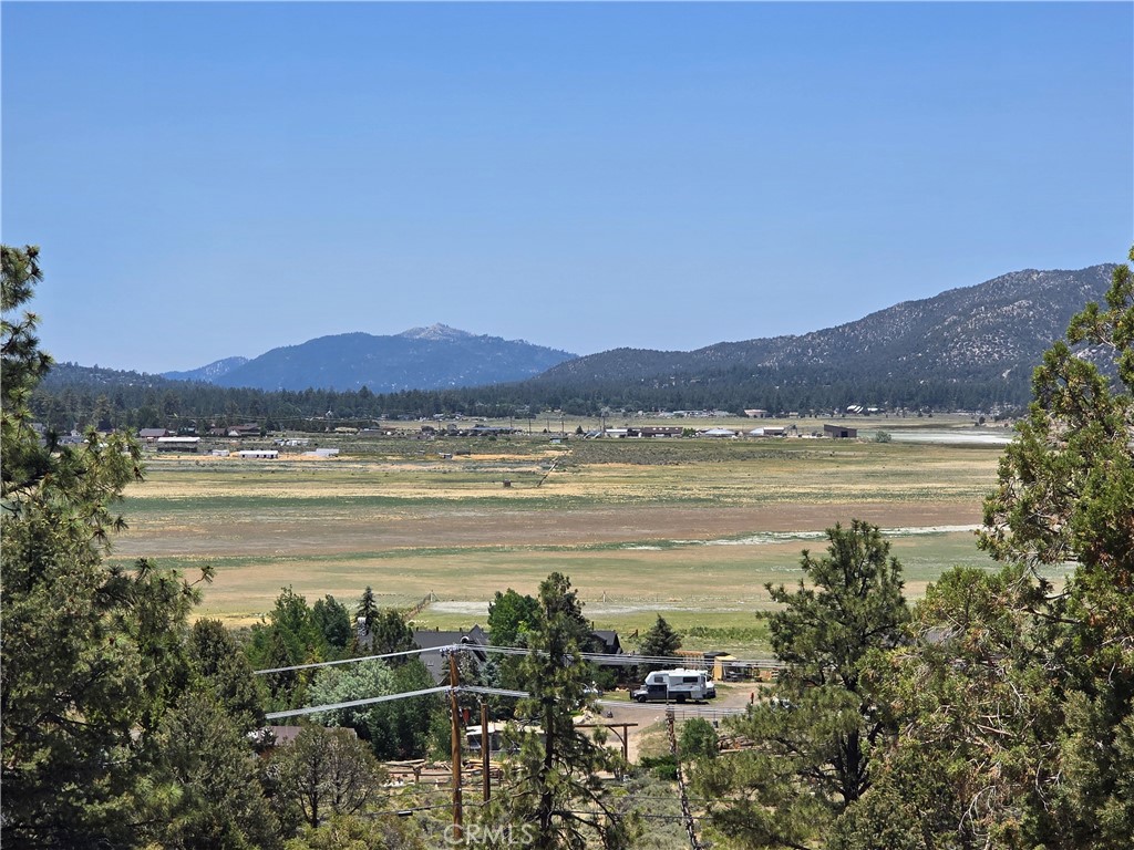 This is a fantastic opportunity!
2.17 acres in Ponderosa Estates with lake views and sights of Bear Mountain Resorts Ski Slopes, Gray’s and Butler’s Peak, and fireworks shows.
The property includes on-site power and spans from Ponderosa Ranch Road to Conchita. Build your dream home with tranquil views and equestrian facilities.
There are flat buildable areas on both streets.
Located in a sought-after ranch style neighborhood, minutes from the lake, skiing, horseback riding, off-roading, mountain biking, and the Pacific Crest Trail. It’s only 15 minutes to town, Big Bear Lake, 2 hours to LA, and Palm Springs casinos. Surrounded by wildlife such as donkeys, hawks, eagles, bears, and bunnies.
Property corners are marked.
Come explore and see for yourself and ...Enjoy the Spectacular View!