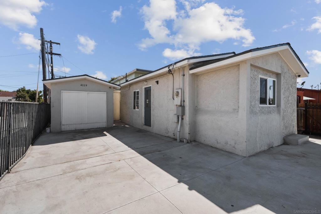 Corner-lot property with income potential! The main home is a fully remodeled 1BD/1BA featuring a newer roof, modern kitchen with quartz countertops, fresh paint, and new flooring throughout. The detached garage has been converted into a studio with kitchen and bath, offering great flexibility for extended family, guests, or rental income. Each unit enjoys its own private yard and entrance. Convenient central San Diego location close to shopping, parks, and freeway access. Excellent opportunity for owner-occupant or investor!