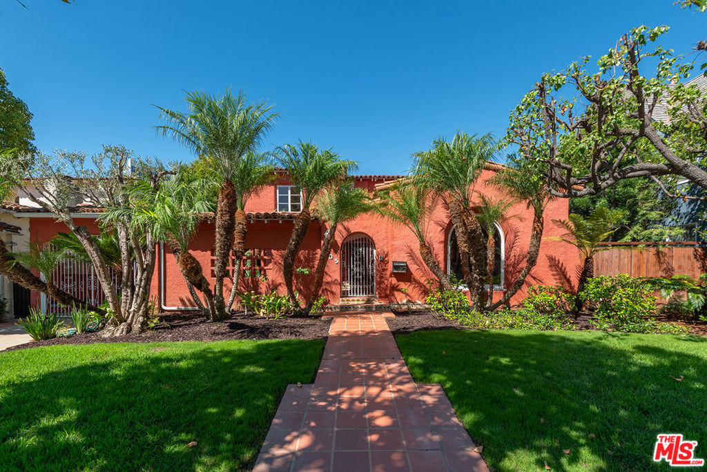 Fixer Opportunity on McCarty Drive Spacious 60-Foot Lot. Built in 1929, this Spanish-style residence offers timeless character and exceptional potential. Behind a gated courtyard, the home features a large living room with dramatic beamed ceilings, formal dining room with large stained glass window, 4 bedrooms, 3.5 bathrooms, and a den. The functional two-story layout includes three bedrooms/2 bathrooms upstairs and one bedroom/2 bathrooms plus den downstairs.The kitchen and charming breakfast room overlook a private backyard with pool ideal for entertaining or relaxing. Located in highly desirable Southwest Beverly Hills, this property has great bones and awaits a buyer ready to restore and transform it into a showcase home.A rare opportunity to own a classic Beverly Hills property with enduring architectural appeal. Bring your contractors. Offers due Thursday, 9/18 at 12 PM.