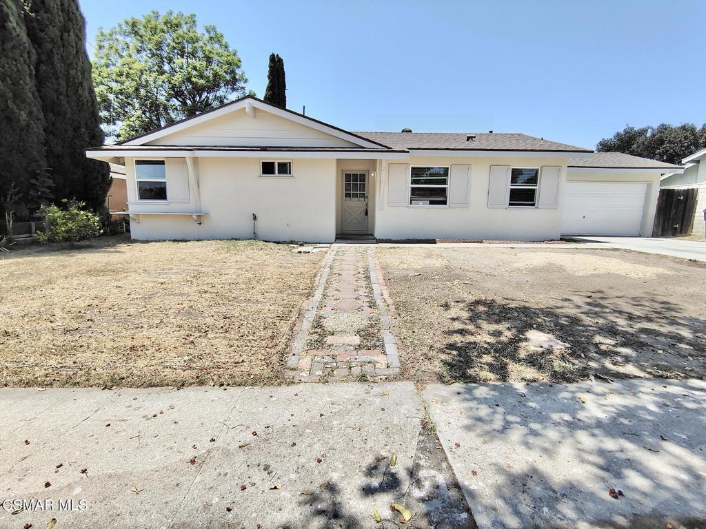Welcome to this charming 3-bedroom, 2-bathroom home with a spacious yard, ready for your personal touch. Step through the front door into the entryway and enjoy the easy flow into the dining area and living room. The bedrooms are conveniently located to the right, while the kitchen--complete with direct access to the garage and laundry area--offers a functional layout with a pantry providing plenty of storage. This home has been refreshed with new vinyl flooring throughout, new windows, new sliding glass door, new 2-inch faux wood blinds, and new toilets to name a few. Fresh interior and exterior paint gives the home a clean, modern feel, ready for you to move in, lender approved. The expansive yard is a blank canvas, perfect for creating the outdoor space of your dreams--whether it's a garden, entertaining area, or play space. Competitively priced, this property is full of potential and waiting for your vision to come to life.