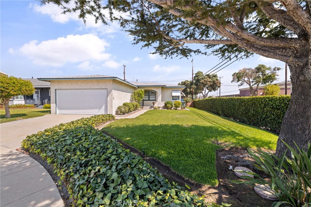 Welcome to this 3 bedroom 2 baths original home in the Lakewood estates, a desirable and beautiful community in the city of Lakewood with easy access to the major freeways. This property is situated at the end of the cul-de-sac on a neighbor friendly quiet street. Featuring a generous sized lot with lush grass lawns in both the front and rear, offering plenty of room for pets, family, and yourself or offering room for a potential ADU if you so desire. The home’s floorpan includes hard wood floors, naturally lighted kitchen with a refrigerator, 2 year old gas range/oven, a useful laundry room featuring a utility sink, washer and dryer, and lots of character for your creative mind to work on. Enjoy your private 2 car garage with a new garage door with keypad and remote access, new LED lighting in garage and driveway space to park more cars. You’ll be happy to hear of a recently installed central air conditioning and heating installed in 2021. An added bonus, a brand new roof just installed as well! This home is located near many local and major businesses and attractions including both the Cerritos and Lakewood malls, numerous restaurants and grocery stores. The public and private schools K- 12 are all with in walking distance. Even local horse stables are nearby. All you need can be found within just a few minutes walk or drive. Cerritos college is a couple miles away as well as Long Beach colleges. The Lakewood estates is near all the major amusement parks and stadiums as well as the beaches which also help keep this area cooler in summer with on shore breeze in the evening. The mountains are only an hour or so drive away for all the winter activities or just relax in the forest. One could go skiing in the morning and then go surfing in the evening on the same day. Long Beach airport is a short drive away it offers numerous flights and services. Lakewood is a great community with lots of facilities, pools and programs for everyone of all ages. You will not be disappointed should you decide to join this community.