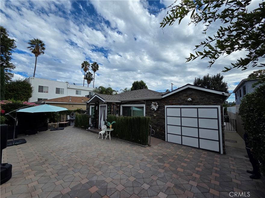 Welcome to your large multi-family home in a perfect neighborhood of Sherman Oaks. This home has been modified previously for a Boarding Care facility and boasts 6 bedrooms and 4 bathrooms, which includes an ADU with its own kitchen and full bathroom in addition to a LARGE fully covered and enclosed lanai for gatherings and events. The property has gone through all of the Department of Health/Fire Department requirements for a licensed care facility with ramps, doorways modified, emergency exits, and a large driveway that can fit multiple vehicles. The property was renovated to include a large entry and foyer with a large ADU attached, to greet your loved ones and guests when you walk inside, and a new guest bath. The home features a large formal living room, dining room, and a separate den and TV room. The kitchen is a modern masterpiece with custom cabinets, displays, and an island. The outside has multiple covered patios and seating areas with an outdoor washer/dryer set-up and cabinets. The home offers copper plumbing, laundry, central A/C and heat, and updated windows. You can use the property for a large family, multi-generation family home, congregate home, care facility, boarding care, rehab, and the possibilities are endless...for you and your family or business. Don't miss this great opportunity!