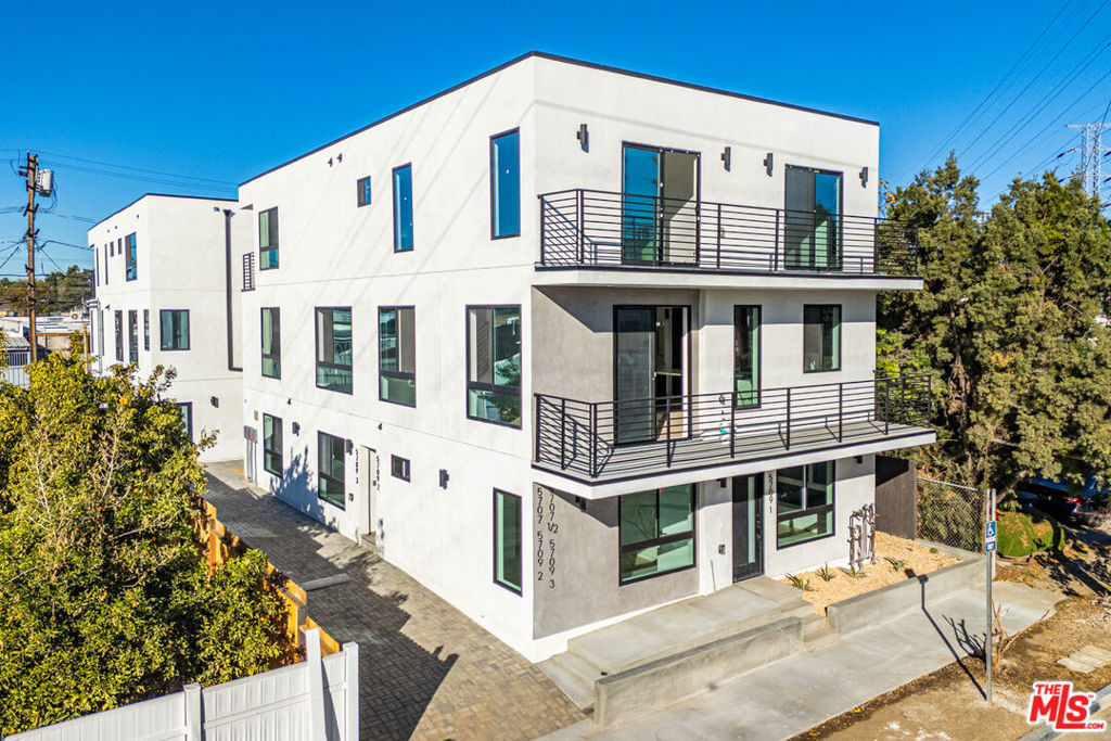 Fully Occupied! Presenting, 5709 Auckland Ave., an exceptional investment opportunity in North Hollywood, immediately adjacent to the City of Burbank! This expansive property boasts an impressive 5.69% pro-forma cap rate, offering investors solid returns in a sought-after location. Offering 5 generously sized units for a total of 18 bedrooms and 17 bathrooms throughout. All 5 units feature large bedrooms and living spaces, open floor plans, and massive windows that flood the space with natural light. Every unit is equipped with custom-designed kitchens, offering a luxurious and modern living experience. The photos speak for themselves! The property includes 8 dedicated parking spaces, all carports, ensuring convenient parking for tenants, an essential feature in the bustling North Hollywood area. Location is a major highlight: just minutes away from the NoHo Arts District, offering tenants easy access to a vibrant neighborhood full of theaters, art galleries, trendy restaurants, and cafes. The property is adjacent to the City of Burbank, giving close access to all Burbank as to offer. It's also near major studios like Universal and Warner Bros., making it attractive to entertainment industry professionals. Additionally, the property is conveniently located close to the Metro Red Line, providing easy access to Downtown LA and surrounding areas. With its spacious units, modern amenities, and prime location, this property is positioned for long-term growth and steady rental demand in one of LA's hottest markets. Don't miss out on this rare opportunity to invest in a high-performing asset in the heart of North Hollywood!