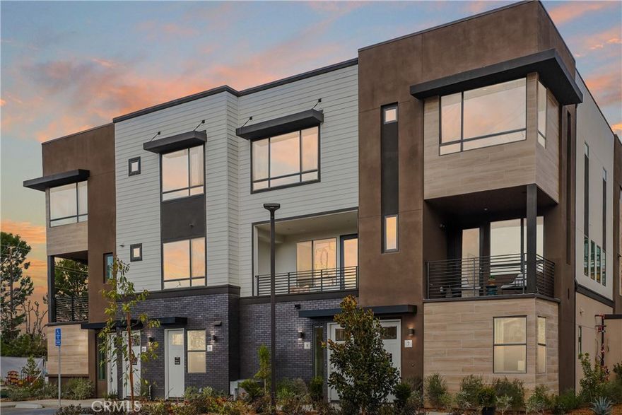 NEW TOWNHOME in a gated community by Bonanni Development in Stanton, close to Rodeo39 and the 22 Freeway.  Three bedrooms and three baths with one bedroom off of the spacious great room.  This plan 2A is light and bright with white cabinets throughout and white quartz countertops. The great room design flows into the kitchen with a generous island and large, private deck.   Plus stainless steel dishwasher and gas range.  Upstairs are two generous bedrooms with walk-in-closets and a convenient laundry area.  Built with state of the art technology, high speed wiring throughout, plus new appliances, cabinets and flooring.  SOLAR PANELS INCLUDED IN PRICE! 



This gated community will have three unique parks for homeowners to enjoy including a private dog park!



Photos are of the models.
