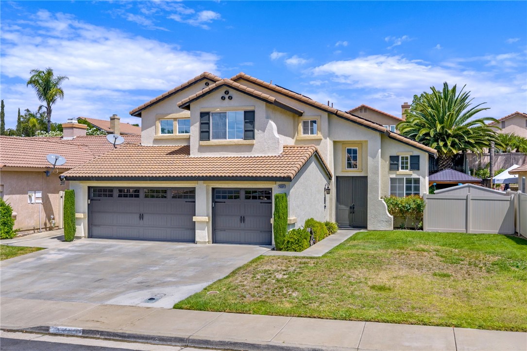 PAID SOLAR!!! That's right, this beautiful Pool Home has paid solar. That means no energy bill for you!!! Located in the desirable city of Murrieta, close to schools, parks, restaurants, shopping, and freeway access. Enter this beautifully updated home through its double-door entry. Enter into the formal entryway, followed by the Formal living room and dining room, featuring white shutters and high vaulted ceilings. The kitchen is open to the family room and features custom white cabinetry with quartz countertops, a beautiful tile backsplash, a large farm-style sink, newer stainless steel appliances, and gold hardware. The Family Room offers a large sliding back door, a fireplace, and a media center.
Guest bedroom and full bathroom downstairs. The bathroom has a walk-in tiled shower, a new vanity, lighting, and quartz countertops. Upstairs includes an additional three bedrooms and two full baths. The primary bedroom is spacious with vaulted ceilings, a walk-in closet, a stunning walk-in shower with dual rainshower and jet shower heads, a bench and niches. Peak-a-boo mountainous views from the additional three bedrooms. The home features vinyl wood flooring throughout with carpet on stairs, upstairs hall, and bedrooms. The private backyard is perfect for relaxing or entertaining, featuring a hot tub and pool, as well as a comfortable seating area under the gazebo with a TV. Pool pump is new, Newer HVAC, New electric Pannel. Front doors are being replaced. All cabinets have soft-close doors and drawers.