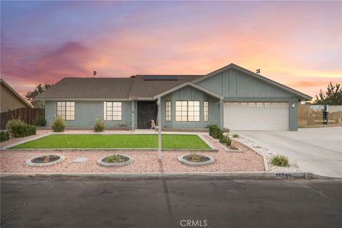 Photo of 11359 Courtside St, Victorville, CA 92392 (MLS # HD25239608)