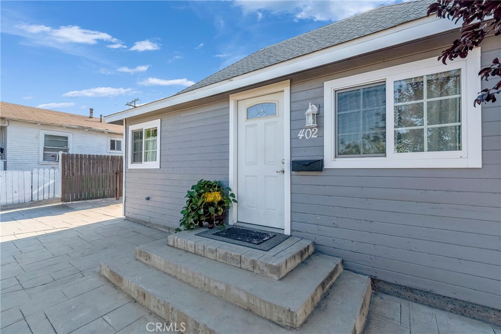 Welcome to this beautifully remodeled 2-bedroom, 2-full bath gem located on Grand Blvd in the heart of the Circle City!! Offering 702 sq ft of living space on a corner lot, this home features modern tile flooring throughout, updated dual-pane windows, a custom California Closet, new kitchen quartz countertops, a water filtration faucet, and a new heating and air conditioning system. This renovation provides a fresh, clean look with low- maintenance in a centralized location ideal for both commuters and city living! The garage has been converted into a studio space (approximately 400 sq ft, unpermitted); buyer to verify and conduct their own due diligence with the local building department. Enjoy up to three vehicles in a spacious driveway along with street parking and alley access. In addition, take advantage of this home’s basement, ideal for more storage!! This home boasts nothing short of its convenient location near the METRO STATION and upcoming DOWNTOWN AREA! Buyers will enjoy this move-in ready home~ the perfect blend of LOCATION, MODERN UPDATES & CLASSIC CHARM! **OPEN HOUSE scheduled for Aug 16th 11-3pm & 17th 12-3pm**