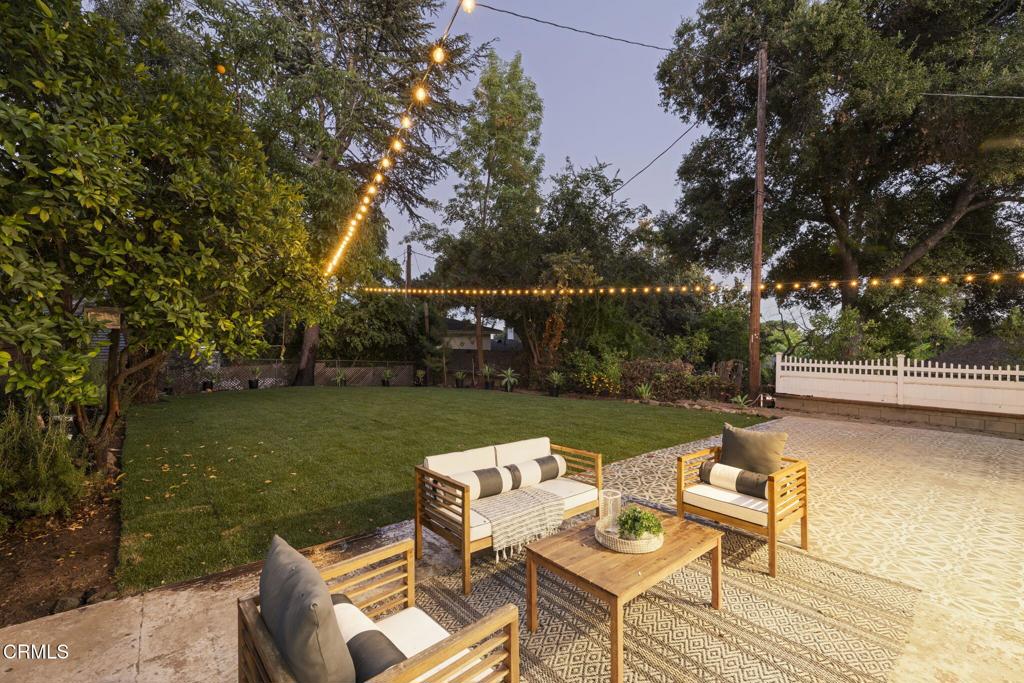 La Canada mid-mod home with Japanese inspiration on a 10,000 SF lot. Spacious driveway with lots of parking leads to the private front yard. Inside, the floor plan is superb, with the common area leading out to the large, newly-landscaped back yard. The kitchen features luxury appliances and a breakfast nook. At the front of the home is the bedroom wing with 2 bathrooms and 4 bedrooms. At the rear of the home is the aforementioned large yard, which offers possibilities for an ADU, a pool, or, given the home's excellent floor plan, a good place for adding something like a large master suite with access to the yard, or even some combination thereof. Home features recessed lights, new AC, new paint and landscaping. Superb La Canada schools K-12.