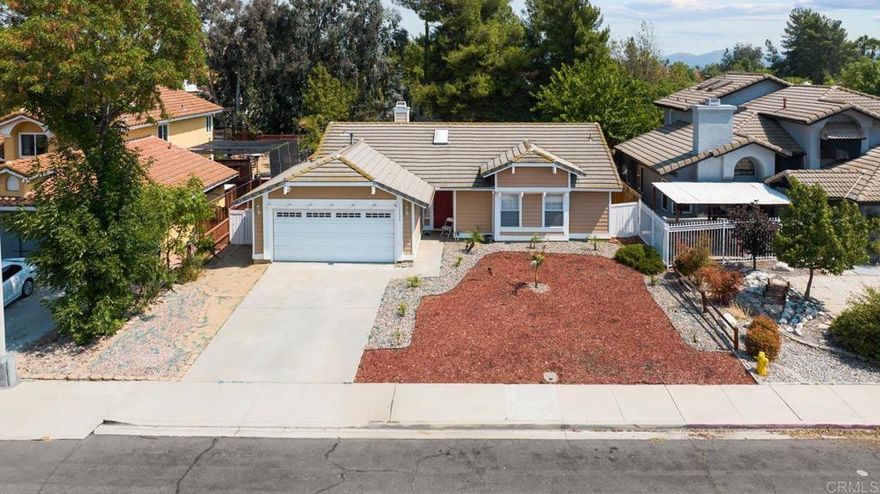Welcome to 39938 Pearl Dr — a beautifully maintained single-family home nestled in a quiet, family-friendly neighborhood. Featuring 3 spacious bedrooms, 2 full bathrooms, and over 1,200 square feet of well-designed living space, this home is perfect for first-time buyers, young families, or anyone seeking comfort and convenience. Step inside to an inviting open-concept layout that seamlessly connects the living room, dining area, and modern kitchen. You'll love the stylish cabinetry, clean finishes, and natural light that fills the space—making it ideal for everyday living and entertaining. Each bedroom offers generous space and a cozy atmosphere, perfect for relaxation and privacy. Sitting on a large 7,405 sq. ft. lot, the backyard provides plenty of room for outdoor fun, gardening, or future expansion. Whether you’re hosting weekend barbecues or enjoying a peaceful evening under the stars, this backyard has it all. Located in a peaceful Murrieta community known for its excellent schools, parks, and amenities, this home offers the perfect blend of tranquility and convenience. Don't miss your chance to make this gem your own—schedule your private tour today!