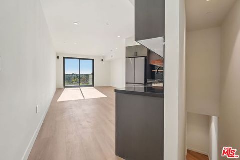 Photo of 1110 S Spaulding Avenue #PH6, Los Angeles, CA 90019 (MLS # 26671039)