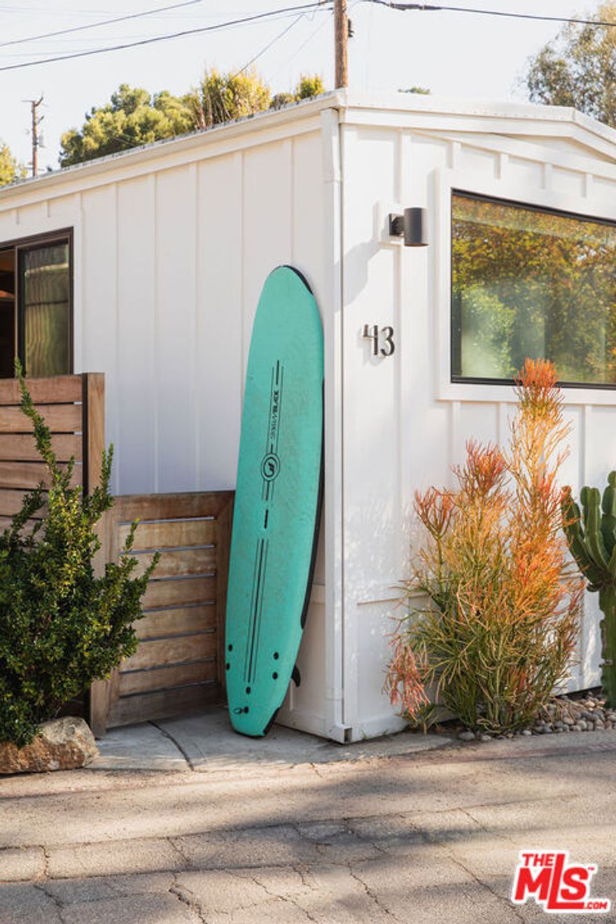 Nestled in the highly coveted Paradise Cove enclave, this home is located in the sought after Lower Bowl and boasts direct access to one of Malibu's most private and picturesque beaches, renowned for its pristine sands and scenic beauty. The recently updated residence combines modern architecture with classic beach-house charm. This home was thoughtfully designed with wood built-ins and top of the line appliances pairing well with its open concept layout. The living room and kitchen blend together seamlessly soaking up the natural light throughout. The bathroom is expansive and features a large soaking tub and shower all beautifully tiled with a stackable Miele washer/dryer. The bedroom creates a warm and comfortable feel with custom wood built-ins. The home offers a seamless indoor-outdoor living experience with its lavish outdoor shower creating the ultimate beach home.