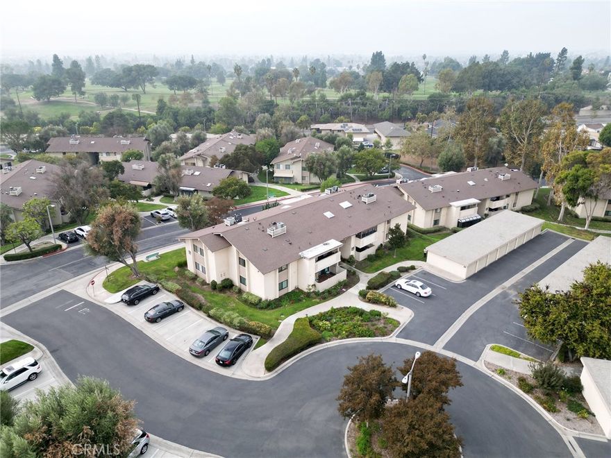 Fantastic! Welcome to this beautiful home at the La Mirada Landmark 55+ Community! This a top floor unit that is also a corner with only one shared wall. Large balcony with enclosed utility room for laundry with washer and dryer coming with the property. Sweeping views of greenbelt, trees, mountains and more in most of the rooms in the home. High ceilings with laminate floorings, skylights, and large sliding glass doors let in a ton of natural light. Kitchen has all electric appliances, white cabinets with granite countertops. Large master suite with huge walk-in closet. Open floor plan with large dining room that opens onto living room. Detached one-car garage with remote control. Complex has 24 hour security guard gate, swimming pool, spa, recreation room with large kitchen, tennis courts, ping pong and picnic area and more! Located within walking distance to La Mirada golf course, and the La Mirada center for performing arts. Much more. A must-see!