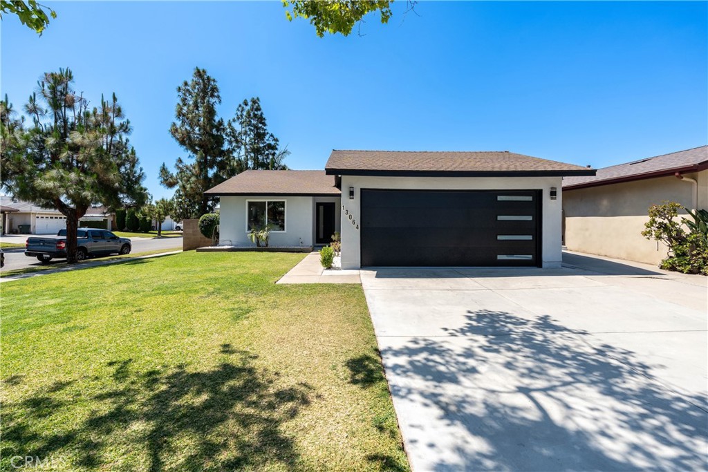 Welcome to this beautifully remodeled dream home, ideally located in the heart of Cerritos.
This thoughtfully upgraded residence blends timeless design with modern elegance, offering a seamless balance of comfort and style.
Situated on a generous 5,456-square-foot lot with 1,100 square feet of refined living space, this home features 3 spacious bedrooms and 2 luxurious bathrooms, all finished with high-end materials and sophisticated designer details.
Step through the inviting entryway into an expansive open-concept living room, where soaring ceilings and wide-plank hardwood floors enhance the airy, elegant ambiance. The layout is ideal for both everyday living and entertaining, providing a perfect harmony of functionality and aesthetic appeal.
The kitchen showcases a large quartzite countertops, custom cabinetry, and premium appliances. It flows effortlessly into the living and dining areas, as well as into the beautifully landscaped outdoor spaces, making it perfect for indoor-outdoor entertaining. A spacious breakfast counter offers additional seating and functionality.
Additional highlights include:
All-new lighting, doors, and windows
Completely remodeled bathrooms
New drywall and fresh exterior stucco
A private primary suite with a custom walk-in closet
An attached 2-car garage with epoxy flooring
Enjoy professionally manicured landscaping in both the front and backyard, creating a serene outdoor retreat.
Located in the vibrant city of Cerritos (Spanish for “little hills”), this home benefits from a community known for its strong city governance, excellent public services, and top-rated schools. It is served by the highly acclaimed ABC Unified School District, consistently ranked among the best in Southern California.