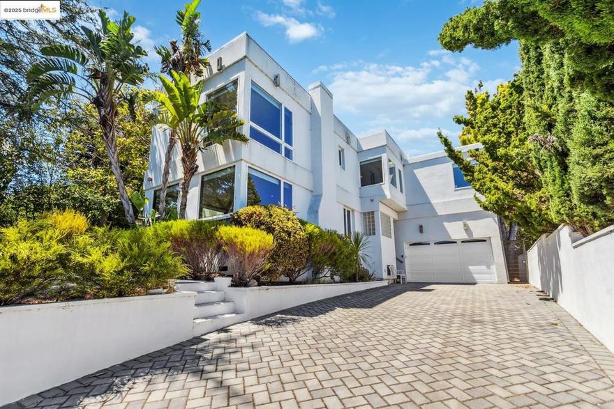 Nestled in the desirable Burlingame Hills, 2912 Hillside Drive offers an unparalleled Burlingame lifestyle. Upon entering, you will be enveloped in a refined living environment. The open-concept layout of the main floor fosters an inviting atmosphere ideal for entertaining, while expansive windows, hardwood floors, and contemporary design elevate every space. The master bedroom provides breathtaking views of the Bay and San Francisco International Airport (SFO). Conveniently located, you can easily access charming downtown Burlingame, top-rated schools, Mills Canyon Park, boutique shopping, and Highway 280.