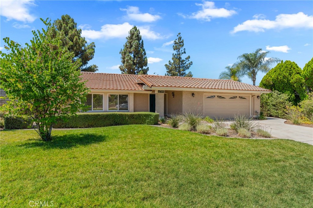 Welcome to your next chapter in beautiful Sycamore Canyon! This charming single-story home offers the perfect blend of comfort, space, and style. Boasting 4 spacious bedrooms and 2.5 bathrooms, you'll enjoy nearly 2,200 square feet of thoughtfully designed living space—ideal for growing families or anyone who loves to entertain. The home features a formal dining room, a cozy family room, and a bright living room that invites relaxation. Dual-pane windows and classic wood shutters add a touch of elegance while keeping the home energy-efficient. The kitchen is a warm and welcoming space, perfect for preparing your favorite meals. Step outside and you'll discover a generously sized covered patio and a beautifully landscaped backyard, perfect for gatherings, or summer evenings under the stars. This is more than just a house—it's a place to call home